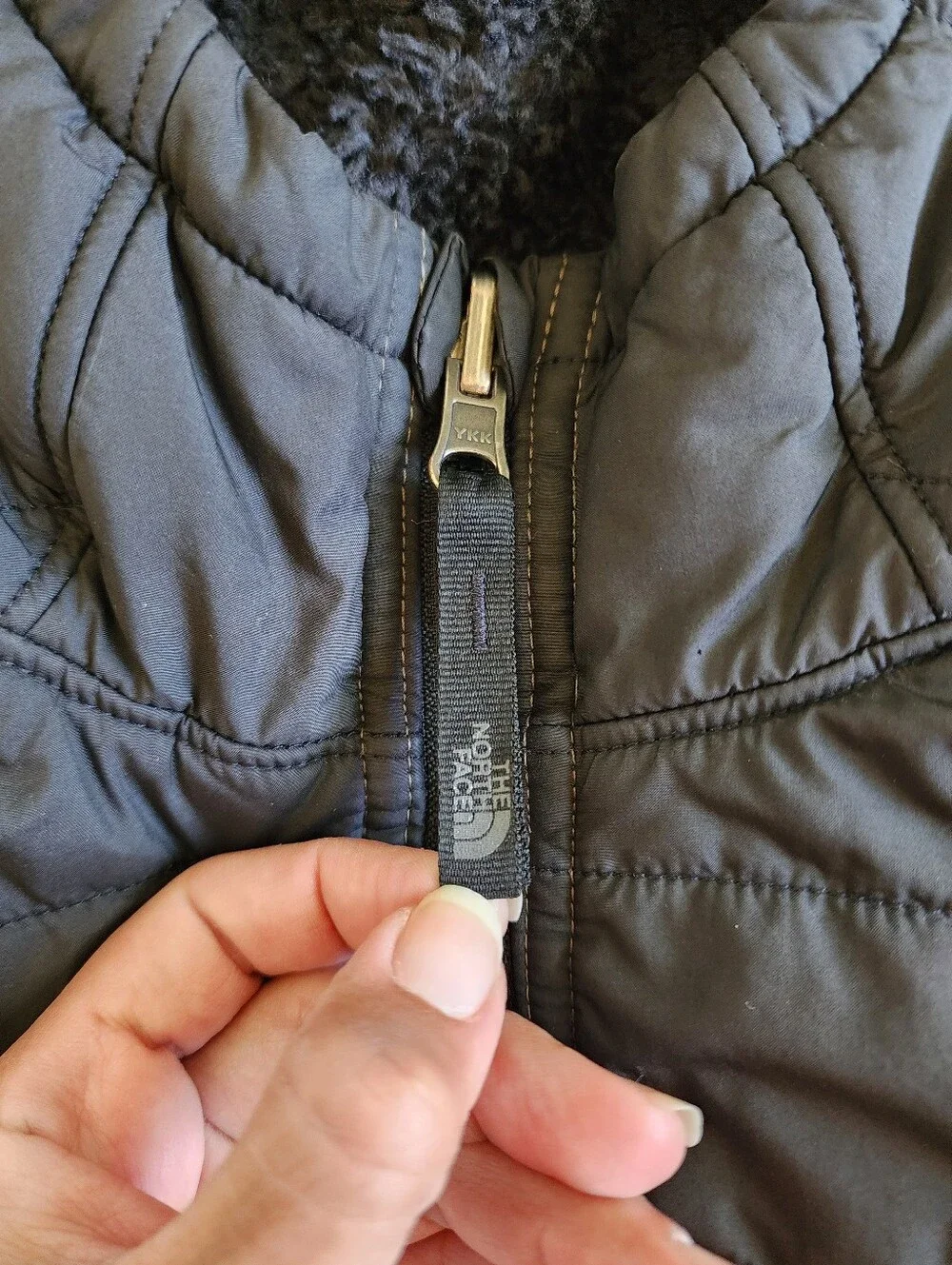The North Face Camouflage Puffer Jacket in Black and Olive YOUTH